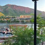 Iron Mountain Hot Springs with the Canyon Spirit train in the background.