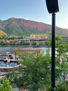 Iron Mountain Hot Springs with the Canyon Spirit train in the background.